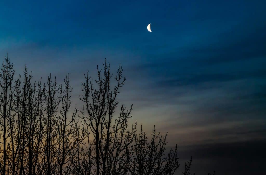 Moon above Reykjavik in Iceland on a calm night