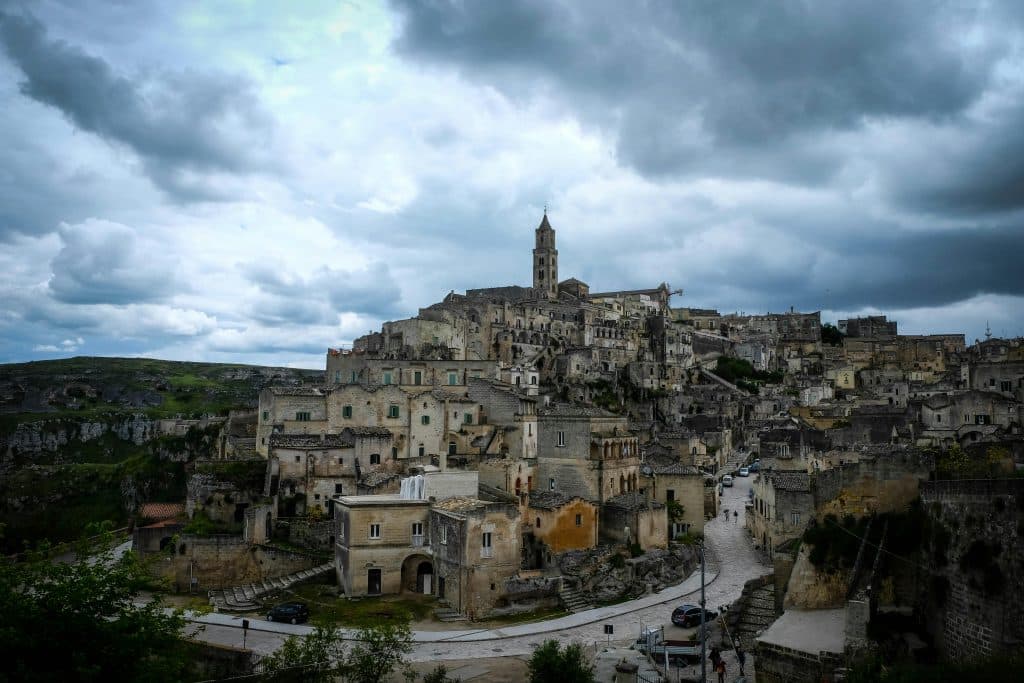 Gray Pavement Beside Brown Concrete Building in Matera Italy