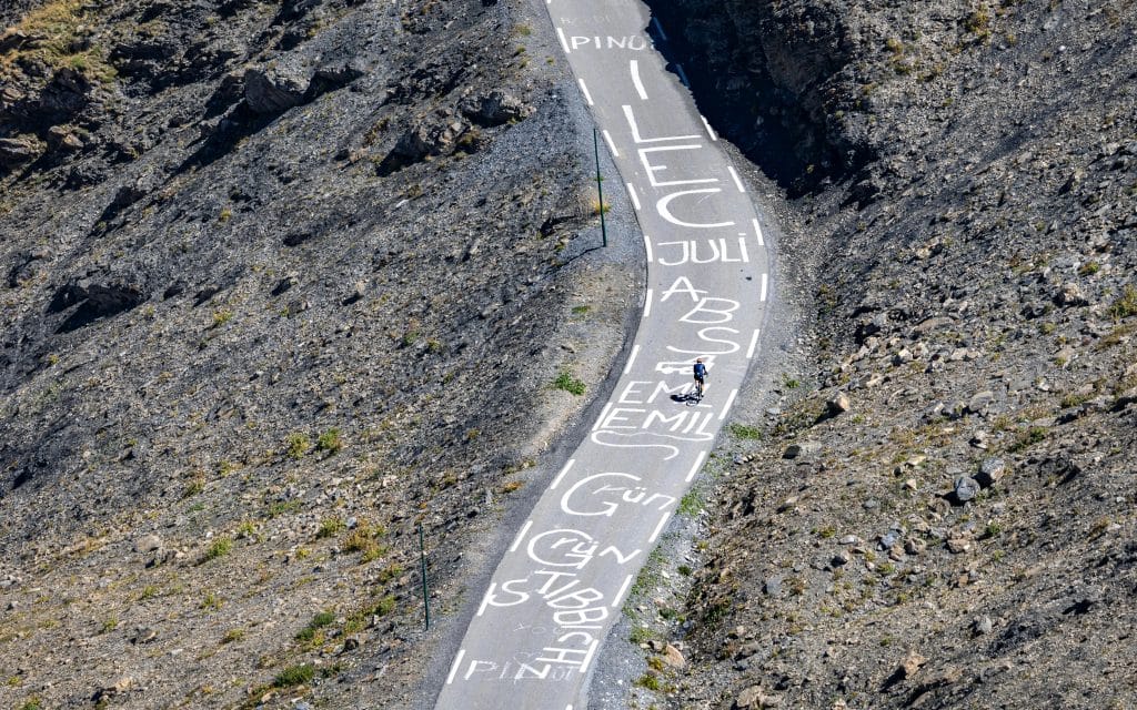 Tour de France Cyclists Names on Mountain Road