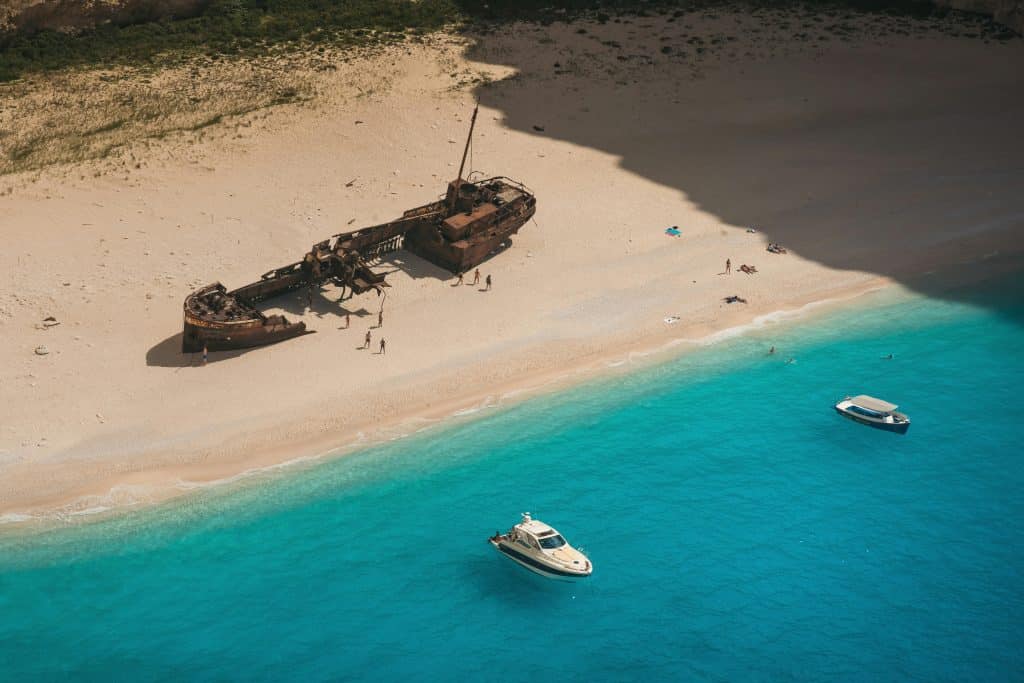 Aerial Photography of Shipwreck on the Sandy Shore of a Beach in Zakynthos, Greece
