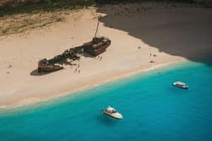 Aerial Photography of Shipwreck on the Sandy Shore of a Beach in Zakynthos, Greece