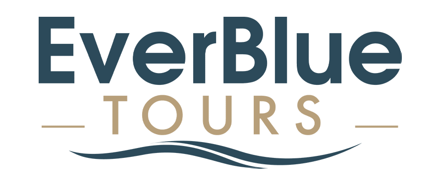 Logo for "EverBlue Tours" with "EverBlue" in bold blue letters above "TOURS" in gold, flanked by horizontal lines, and blue wave graphics below, on a light background—perfect for fans of Juniper Tours seeking a fresh look.